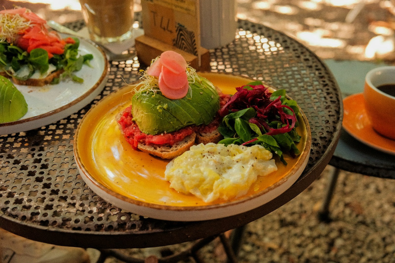 Avocado toast with eggs and salad, an illustrative brunch photograph