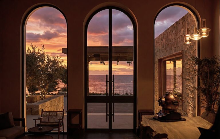 Sunset through the arched entrance at PHOS Restaurant in Pegeia, Paphos