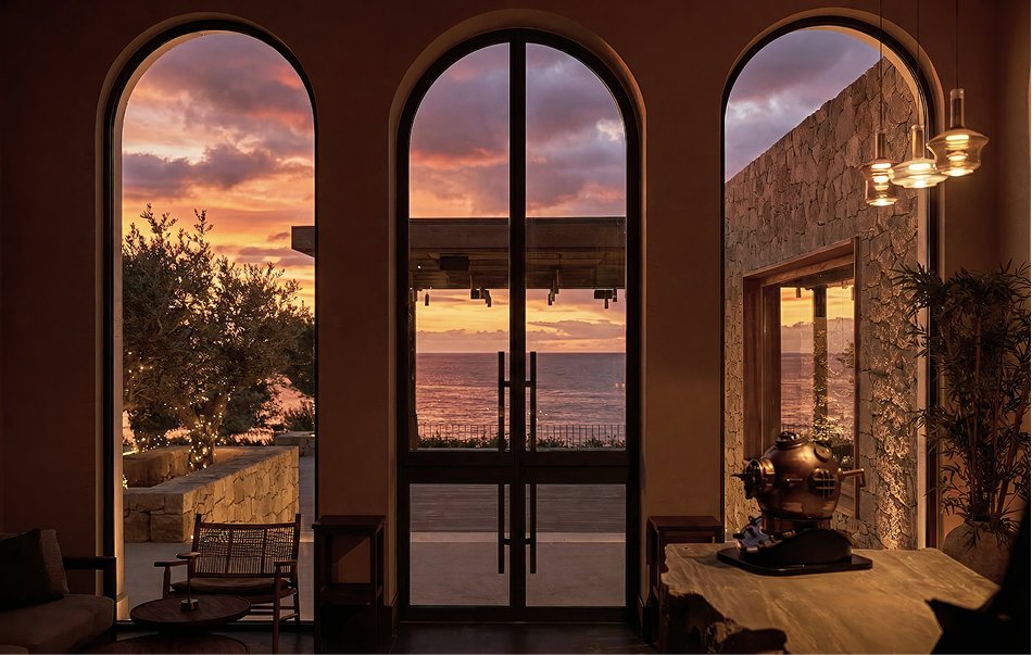 Sunset through the arched entrance at PHOS Restaurant in Pegeia, Paphos